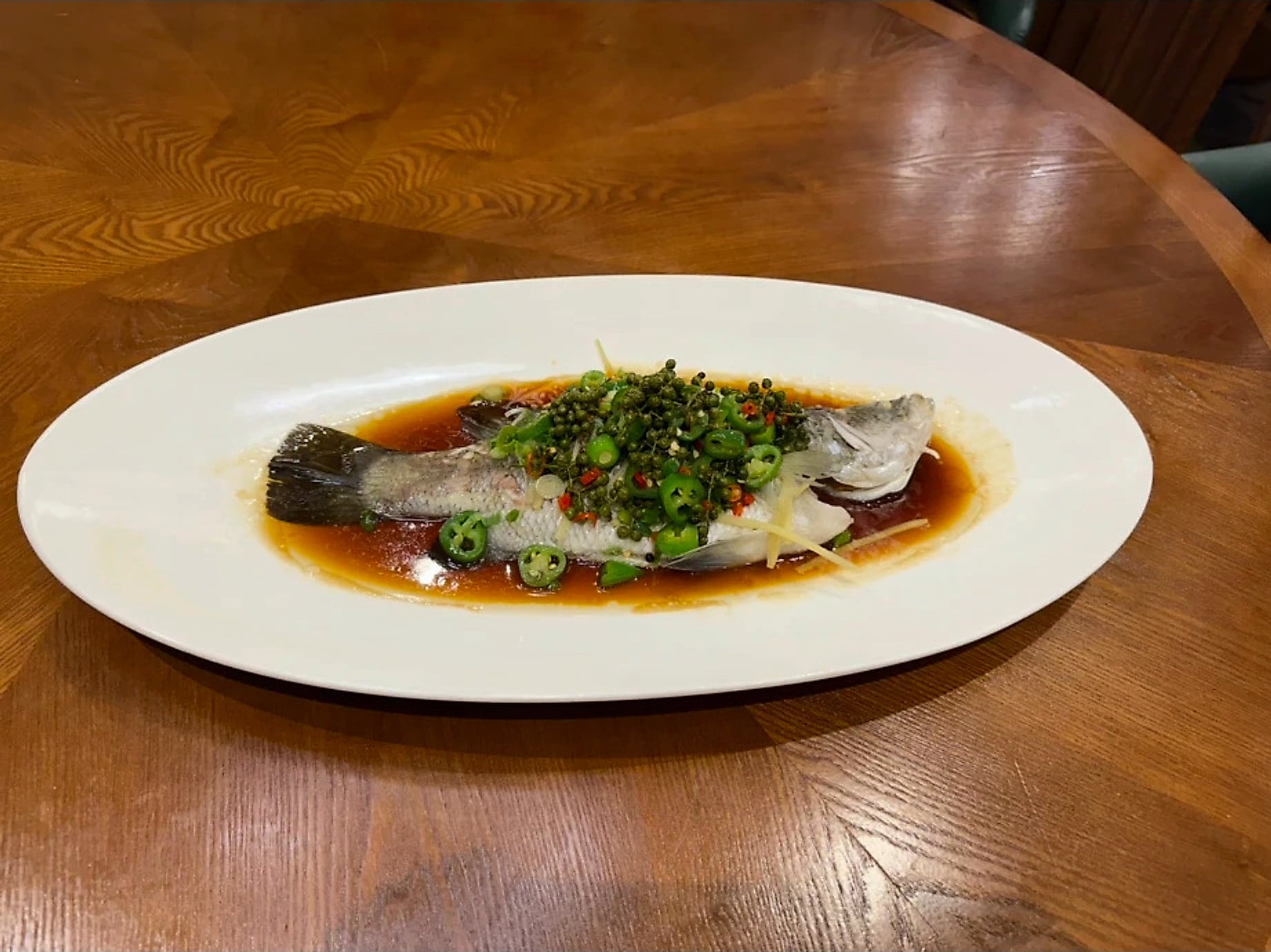 青花椒呛泼桂花鱼 · Green Peppercorn Steamed Live Barramundi